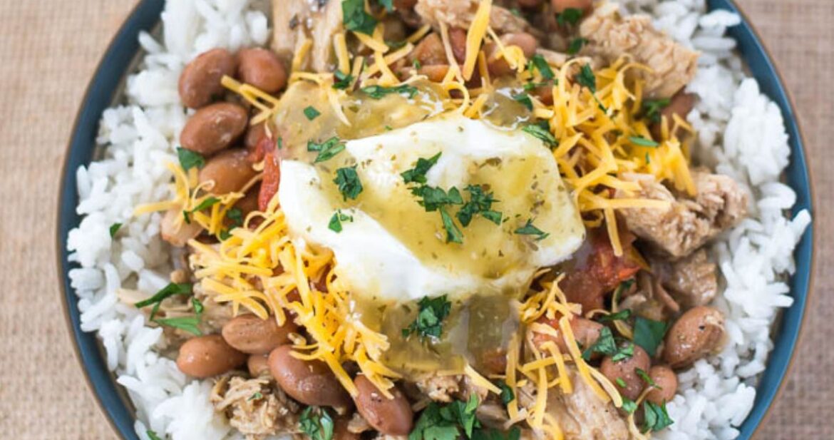 Overhead image of Pork Chalupa Rice Bowl with toppings.