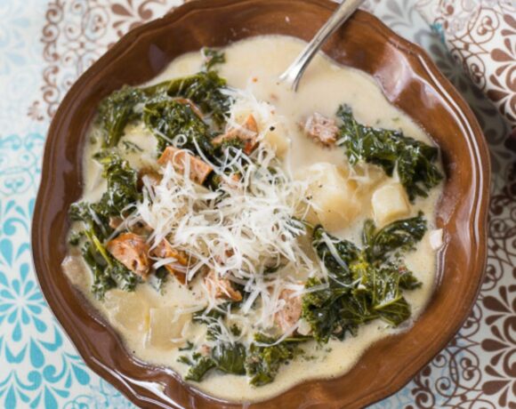 Zuppa Toscana Soup served in a brown bowl.