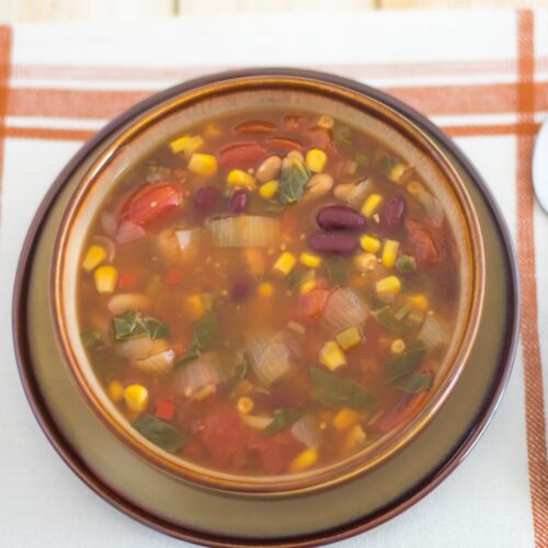 Vegetarian Bean Soup in a brown soup bowl.