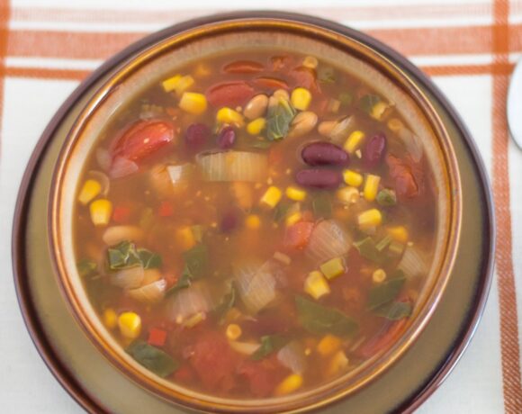 Vegetarian Bean Soup in a brown soup bowl.